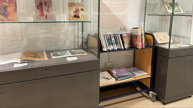 Exhibition cases and book trolley